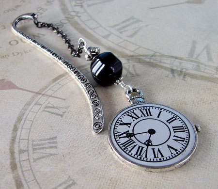 Pocket Watch Face Attached To An Antique Silver-Plated Bookmark Hook