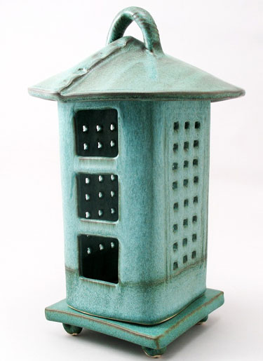 Porcelain and Stoneware Votive Lantern With A Rustic Bronze Glaze